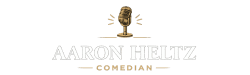 Aaron Heltz comedian logo with vintage microphone